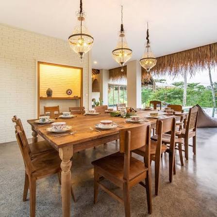 The villa’s dining room prepared for shared meals