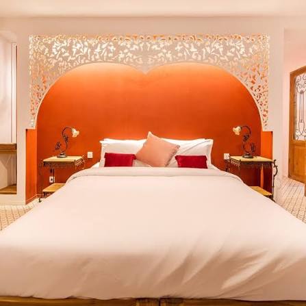 A comfortable, spacious bedroom in the private villa